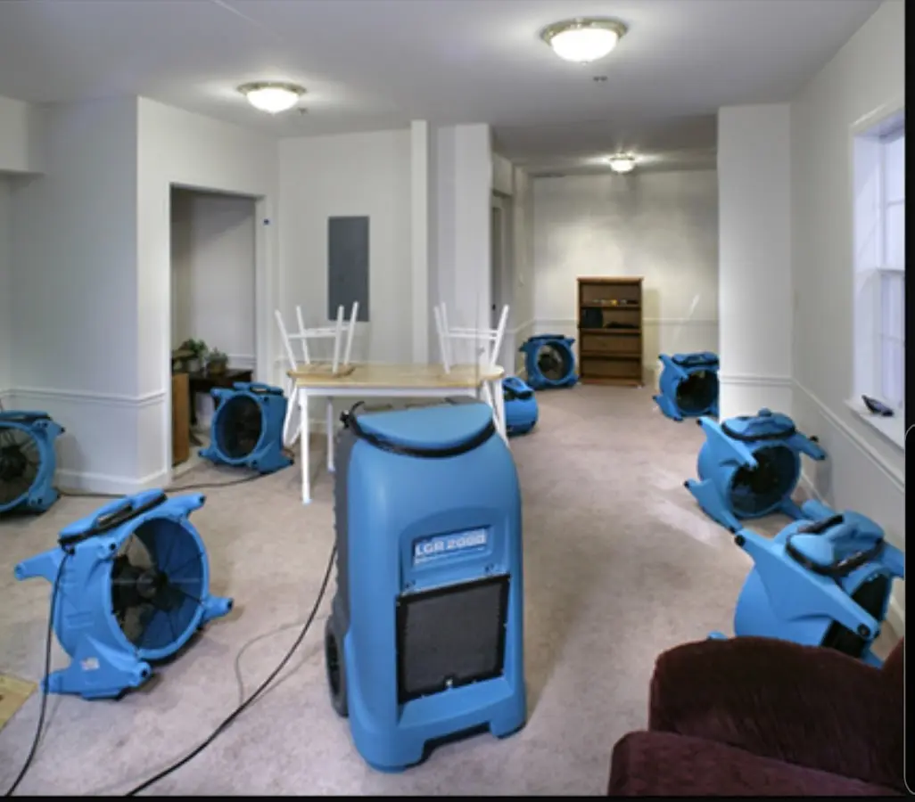 Air movers and dehumidifier setup for Water Damage Restoration in The Woodlands